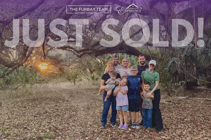 Family on a 75 acre property under oak trees