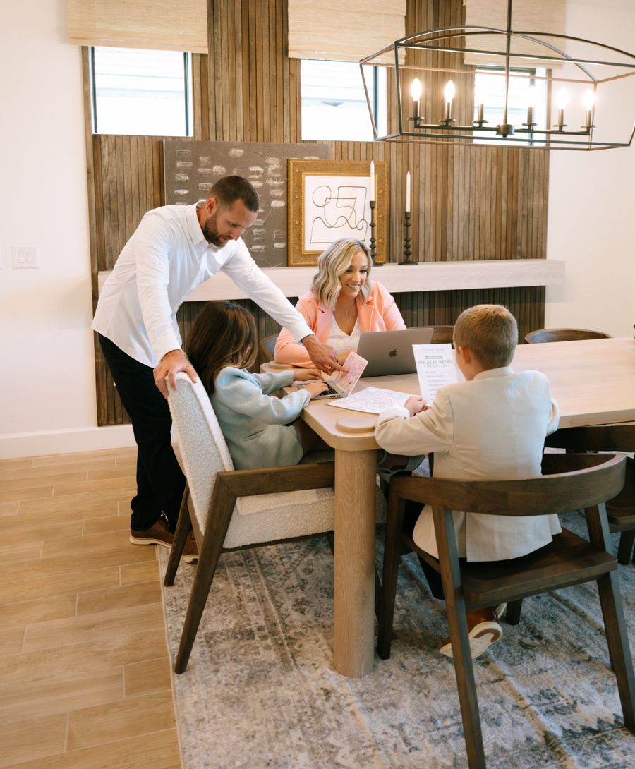 The Furbay family working together at the dining table
